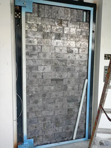 illustration_3_Instalación de puertas con protección radiológica..webp
